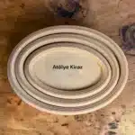 Atölye Kiraz mutfak duvarları için boyanabilir mdf üçlü pano seti ham ahşap içiçe geçmiş oval tablolar ahşap zemin çekimi