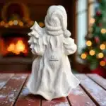 Ham Polyester Yılbaşı Hediyesi Tutan Noel Baba Heykeli : Yılbaşı Hediyesi ve Ev Dekoru - (11x16x27 cm)